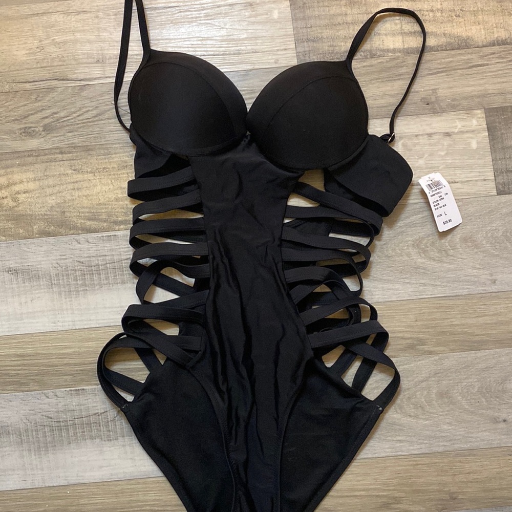 One piece bikini never worn , too big for me